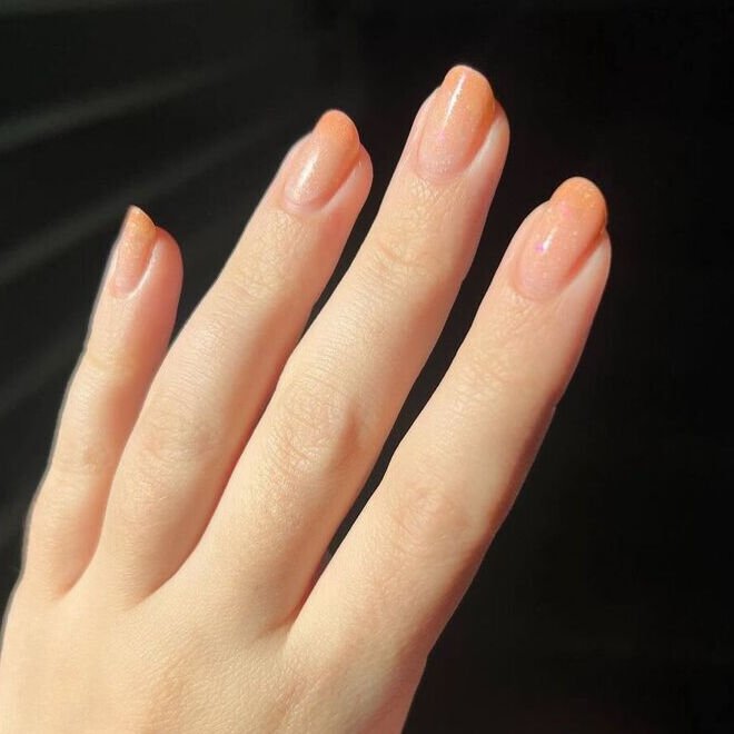 Peach fuzz manicure in the color of the year 2024 photo
